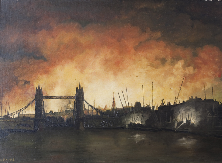 London's skyline including Tower Bridge illuminated in flame