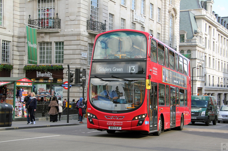 A red double-decker bus - number 13
