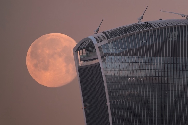 20 Fenchurch street known as the walkie-talkie eclipsing the moon
