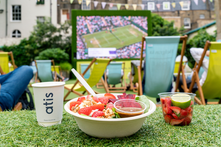 Strawberries and Pimm's in front of a big screen with tennis on