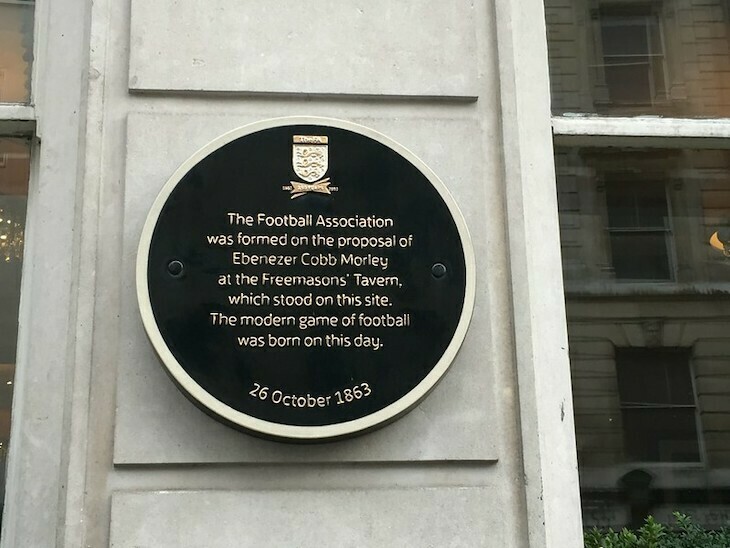 A black plaque noting the foundation of the football association