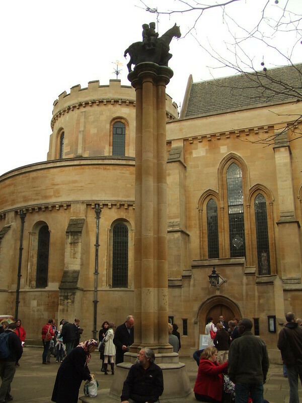 A column topped by two men on a horse near Temple church