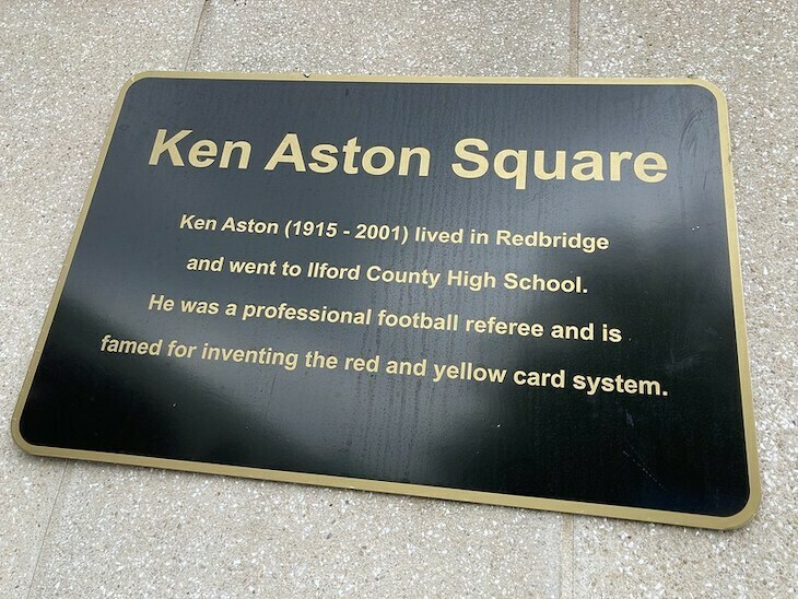 A plaque naming Ken Aston Square