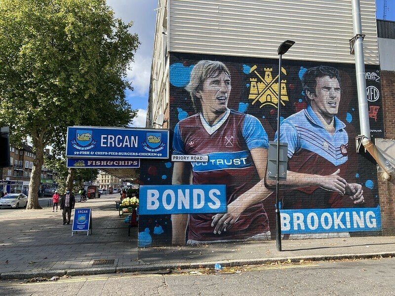 A mural showing West Ham legends Billy Bonds and Trevor Brooking