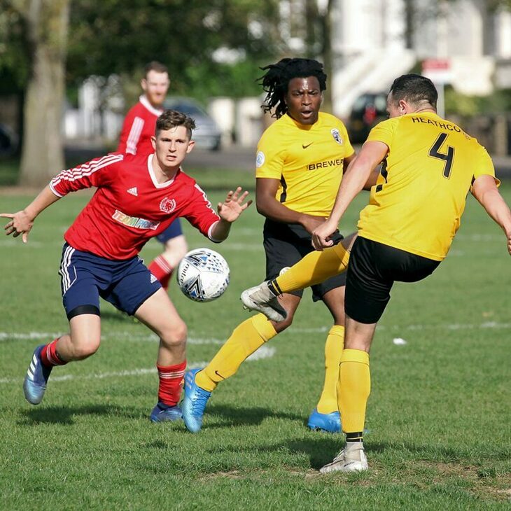 The Titans playing in the yellow kit against a team in red
