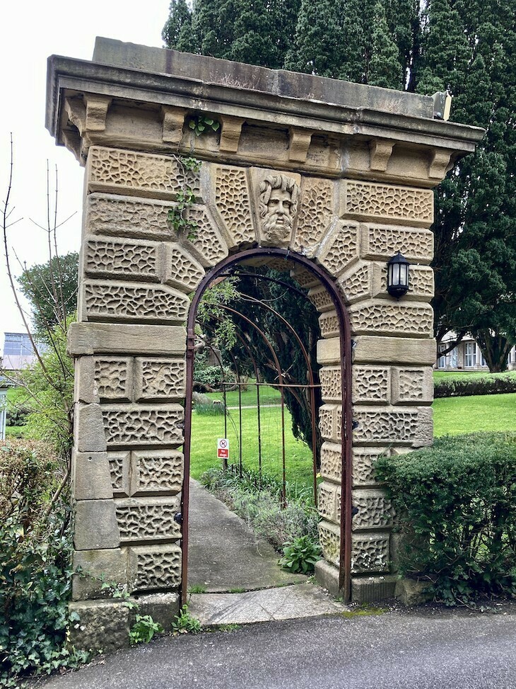 A stone arch at Purbeck House Hotel, with heavy vermiculation 