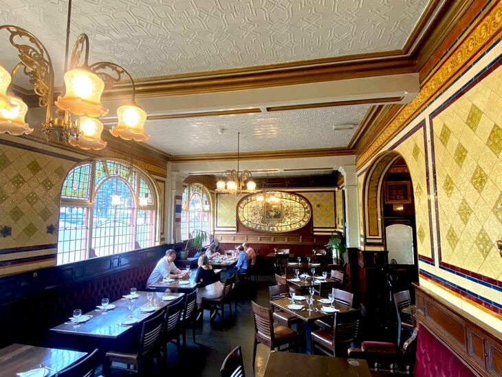 Things to do in Birmingham: A beautiful glazed tile pub with arched windows