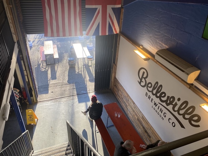 Brewery taprooms in London: The star spangled banner and union flag hand from the rafters
