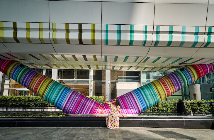 The V-shaped support structure covered in colourful wrap
