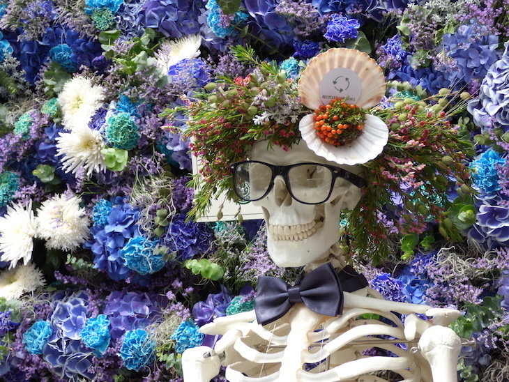 Chelsea in Bloom: a skeleton surrounded by blue-hued flowers and seashells