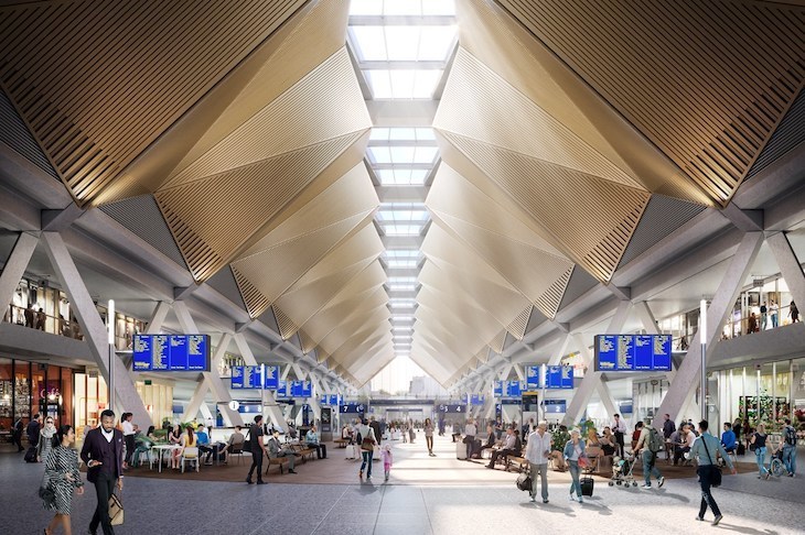 The interior of future Euston, with a yellow triangle-ridden roof and lots of blue departure boards along the edges.