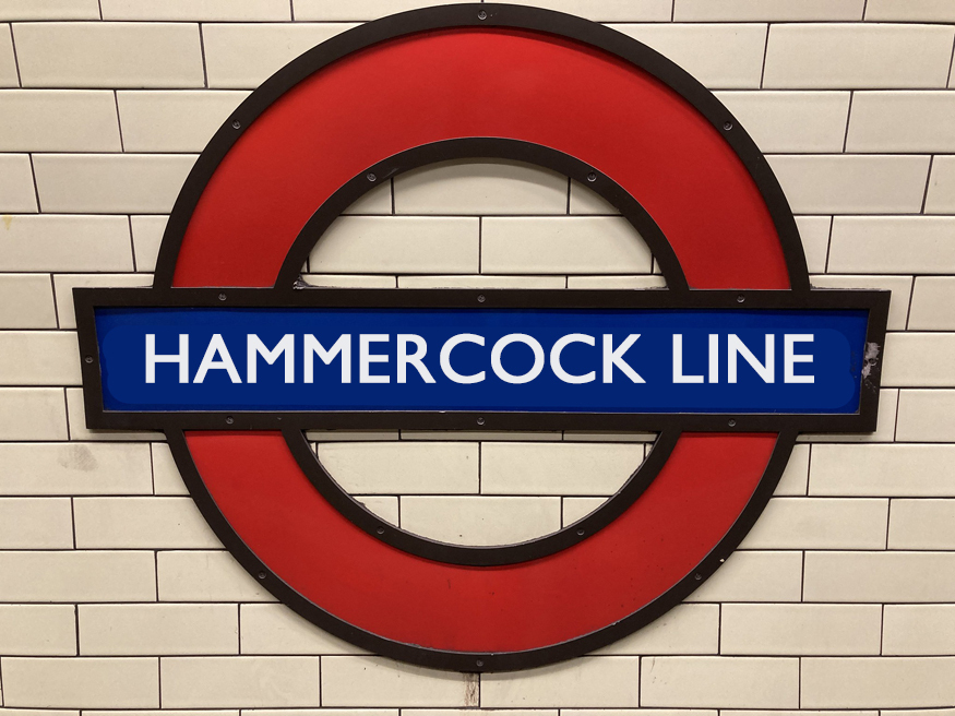 A roundel giving a tube station name as Hammercock Line.