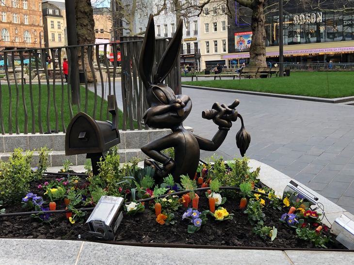 Bugs Bunny popping out of flower bed in Leicester Square