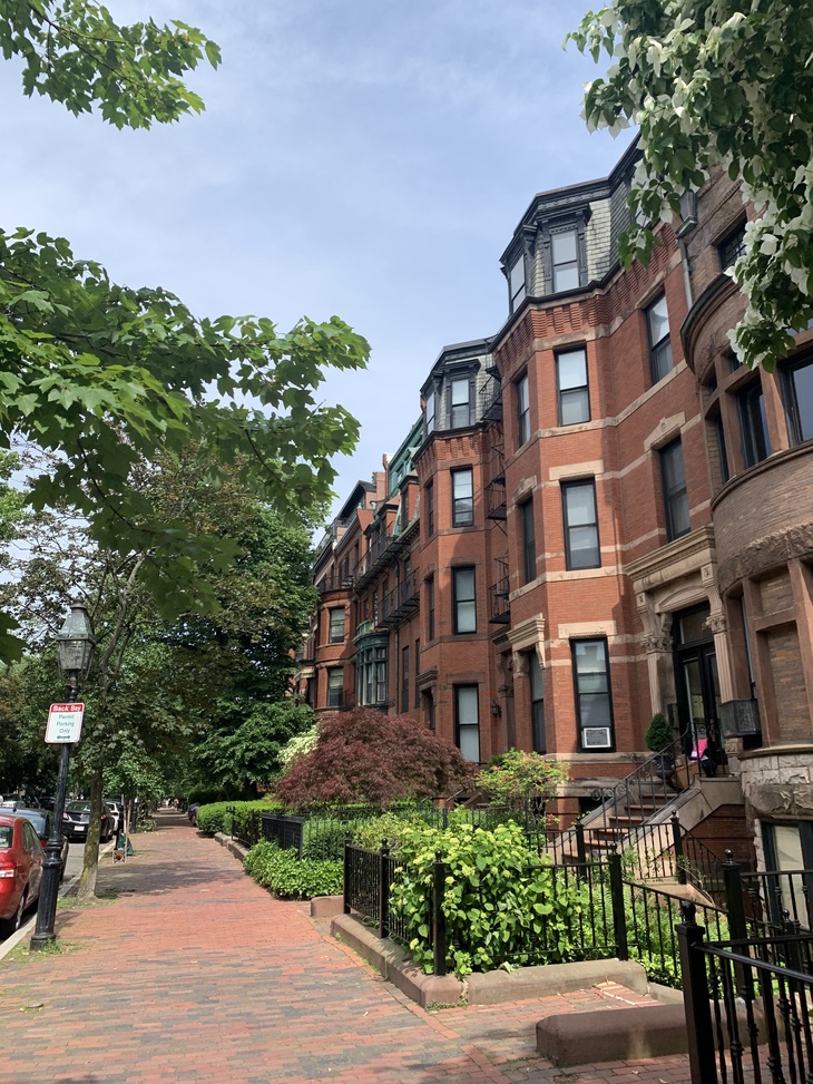 Best Things to Do in Boston: View of red brick brownstones in Boston, MA.