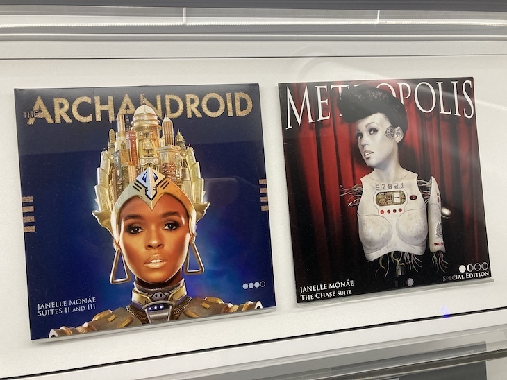 Two album covers with Janelle Monáe in scifi gear