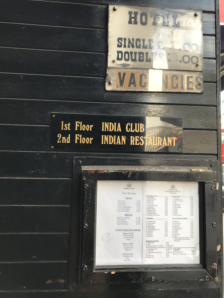 An unassuming sign for the India Club and Indian Restaurant