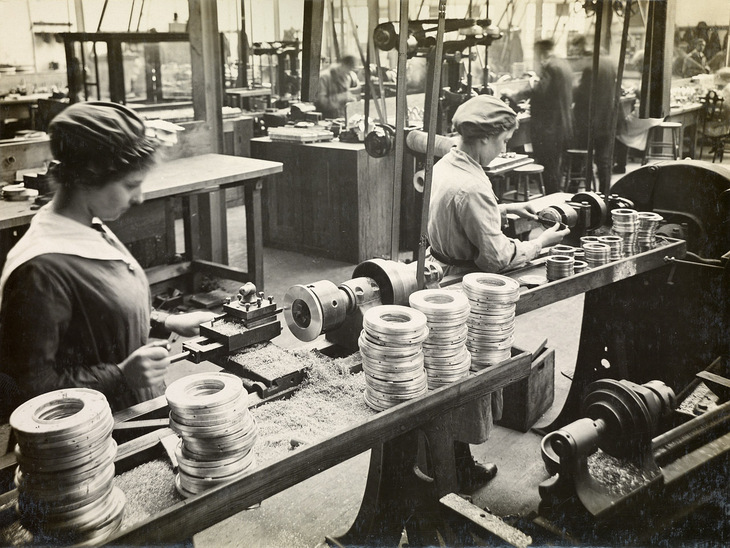 Black and white image of women working in a factory