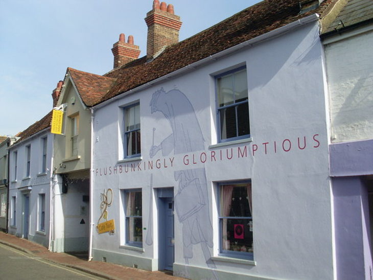 Literary days out: a whitewashed terraced house with a huge mural of the BFG and the words 'flushbunkingly gloriumptious' painted on the front.