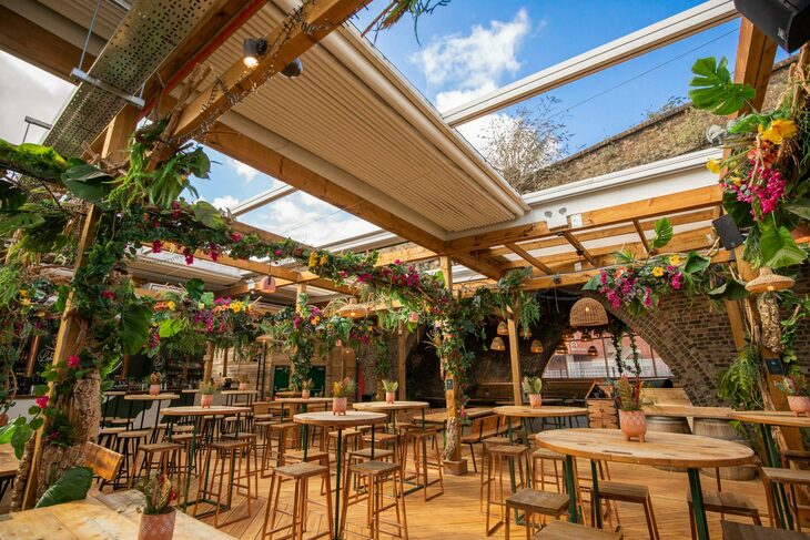 Best rooftop bars London: A rooftop bar decked out in lost of flowers and greenery