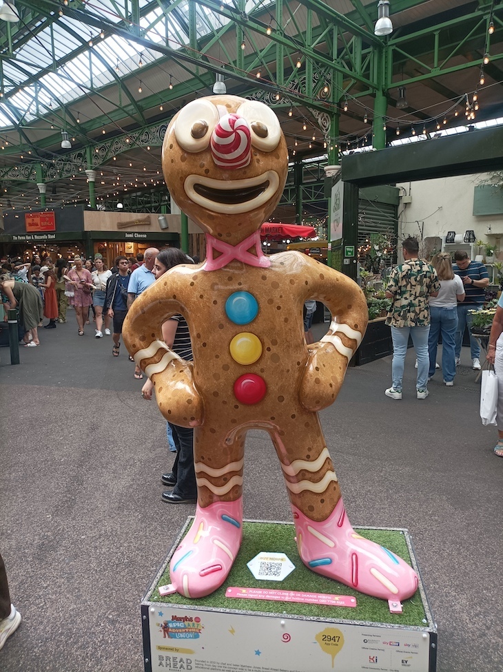 A gingerbread Morph standing in Borough Market