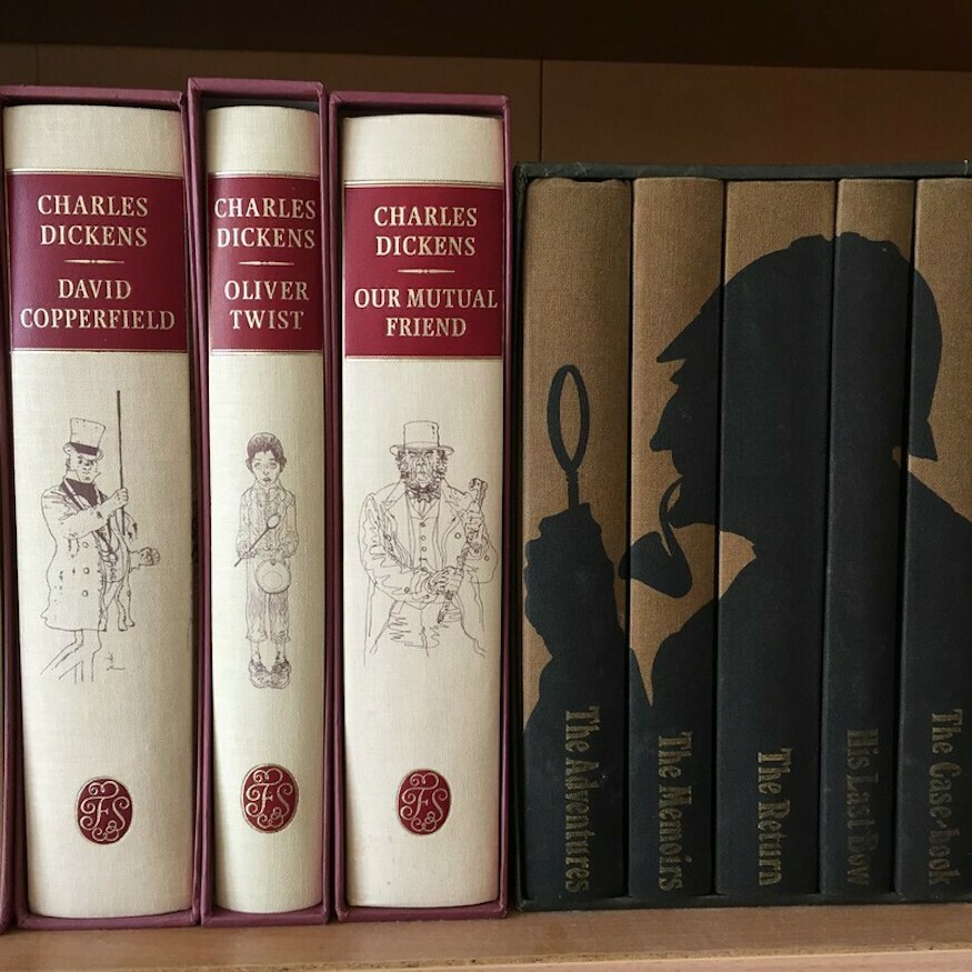 Famous London novels - four volumes of Sherlock Holmes and three by Charles Dickens share a book shelf