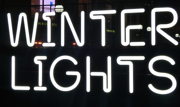 'Winter Lights' written in white glowing letters