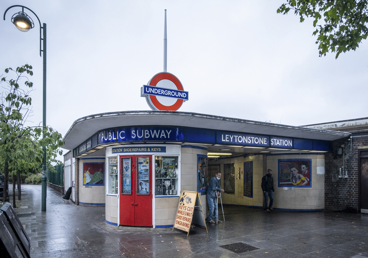 The curved facade of Leytonstone tube station - with some Hitchcock mosaics visible in the entrance hall