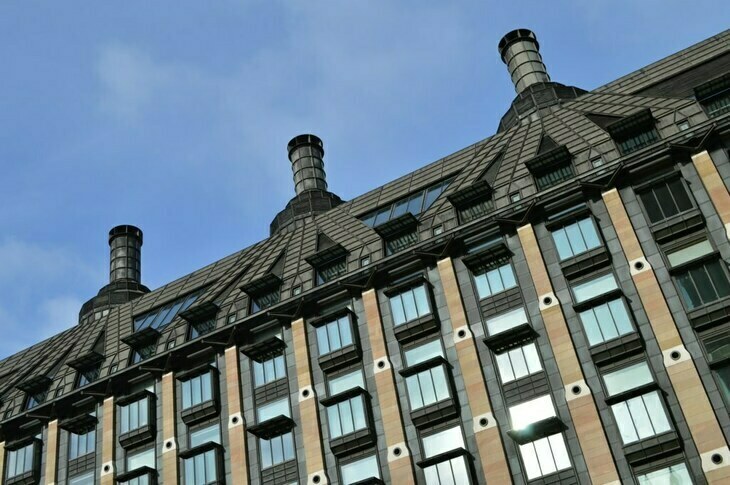 Detail of Portcullis House by Michael Hopkins, showing the gothic style chimneys on the roof