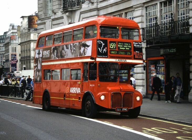 A vintage Routemaster bus on the road