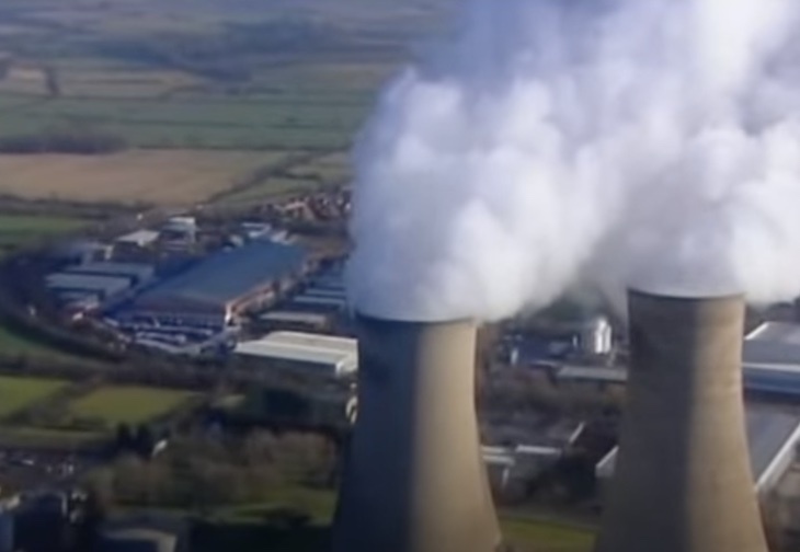 Billowing smoke from two cooling towers, as seen from above