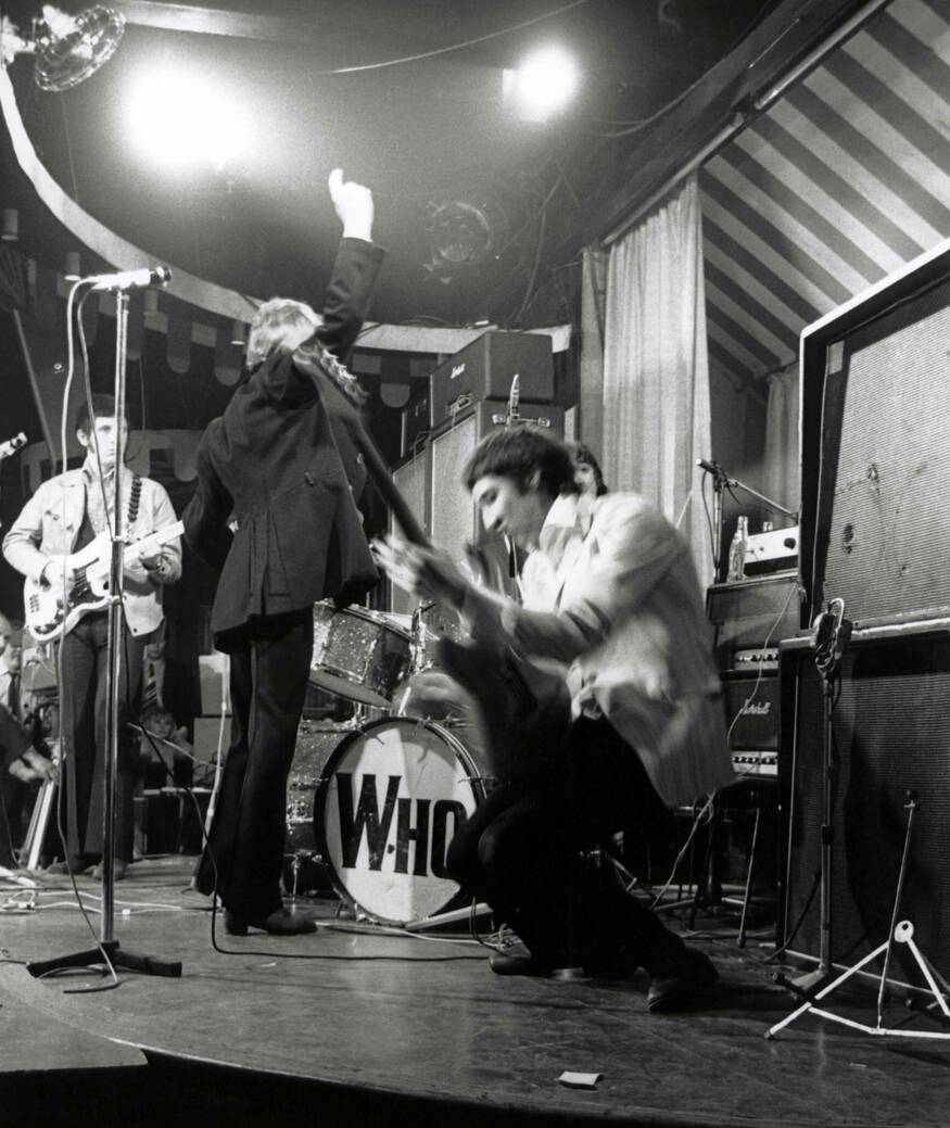 Black and white image of the Who playing on a stage