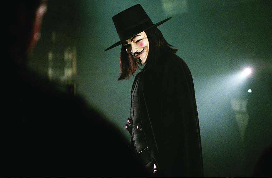 A still from V for Vendetta showing V in his guy fawkes mask staring toward us