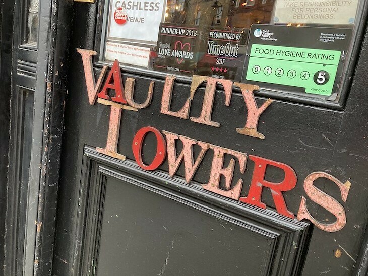 Vaulty Towers door sign
