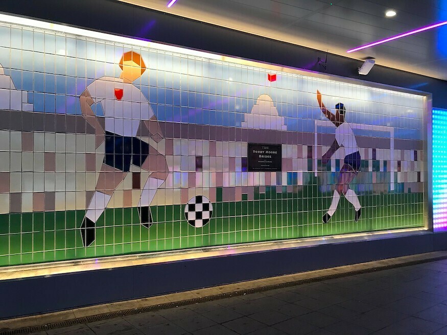 A tiled image of football at Wembley