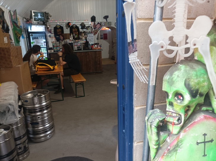 A green skull 'peeks' into the taproom
