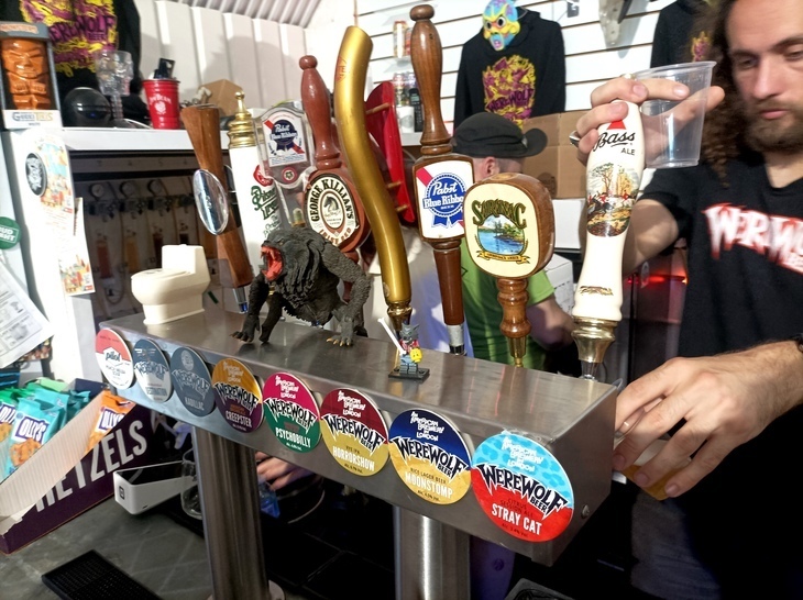 Brewery taprooms in London: Pints being poured from a cluttered array of American style beer taps
