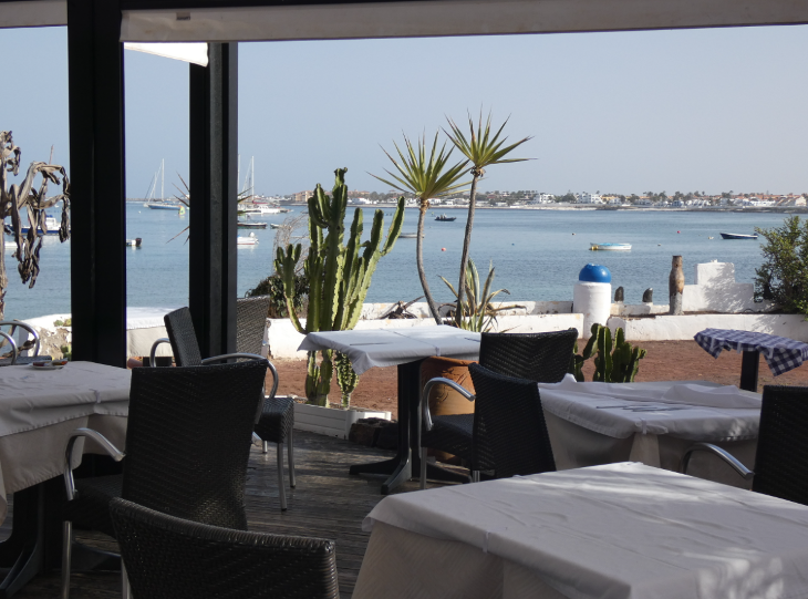 Corralejo in Fuerteventura: a seafront restaurant in Corralejo, with views over the harbour and beach