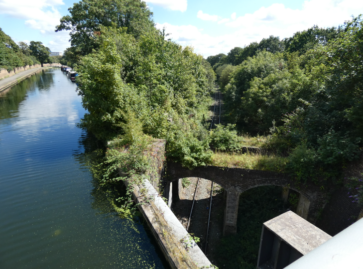 Looking down on a canal (left) and railway (right).