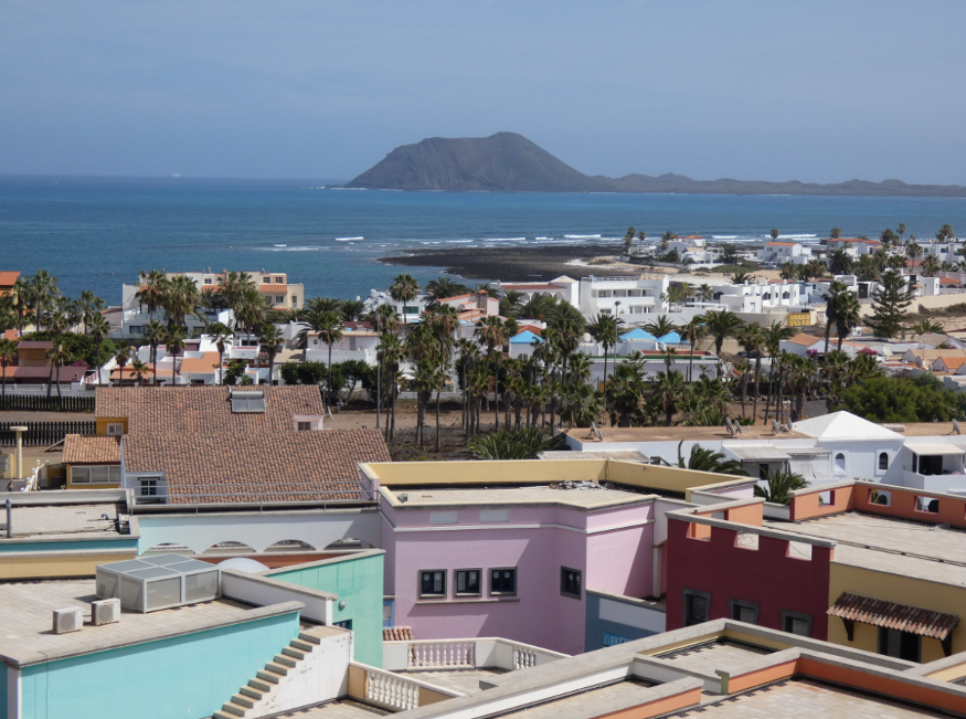 Corralejo in Fuerteventura: a view across the town and sea towards the neighbouring island of Los Lobos.