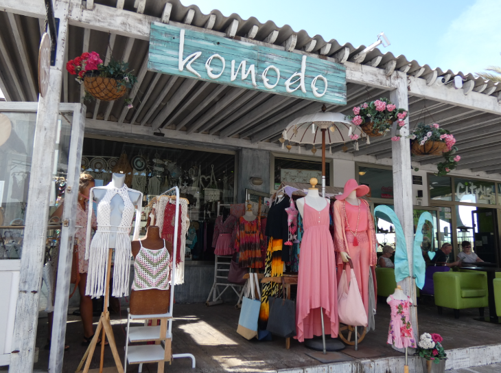 Corralejo in Fuerteventura: exterior of Komodo, a shop displaying dresses and other beach accessories